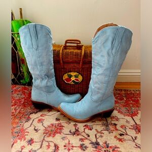 Brand new! Baby blue cowboy boots. Suede like material that is semi-slouch.